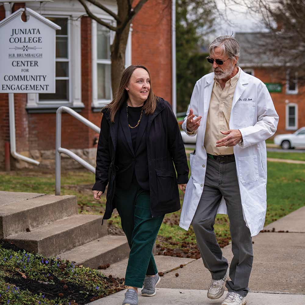 Sarah Worley ’00, director of community engaged teaching and learning, discusses rural health initiatives with Dr. John Roth, CEO of Broad Top Area Medical Center.