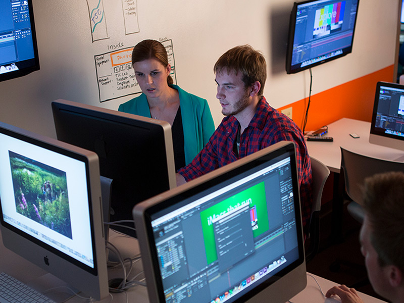 Justine Black and student in technology computer lab