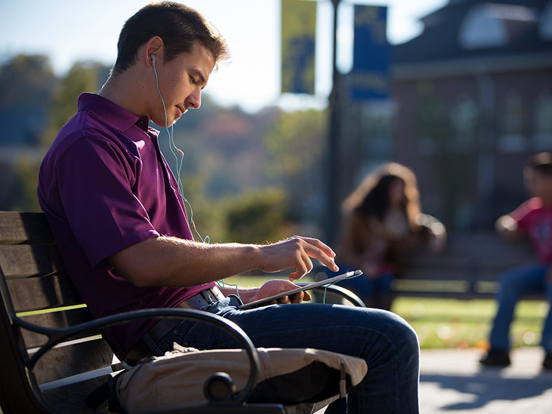 photo of student using a tablet