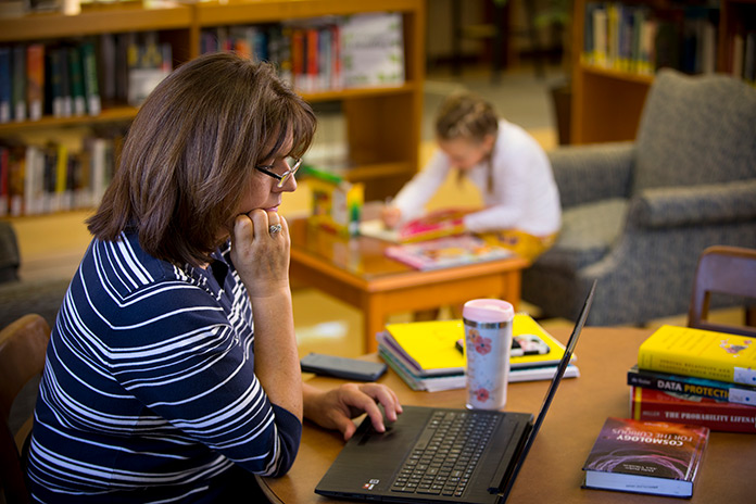 photo of an adult learner studying