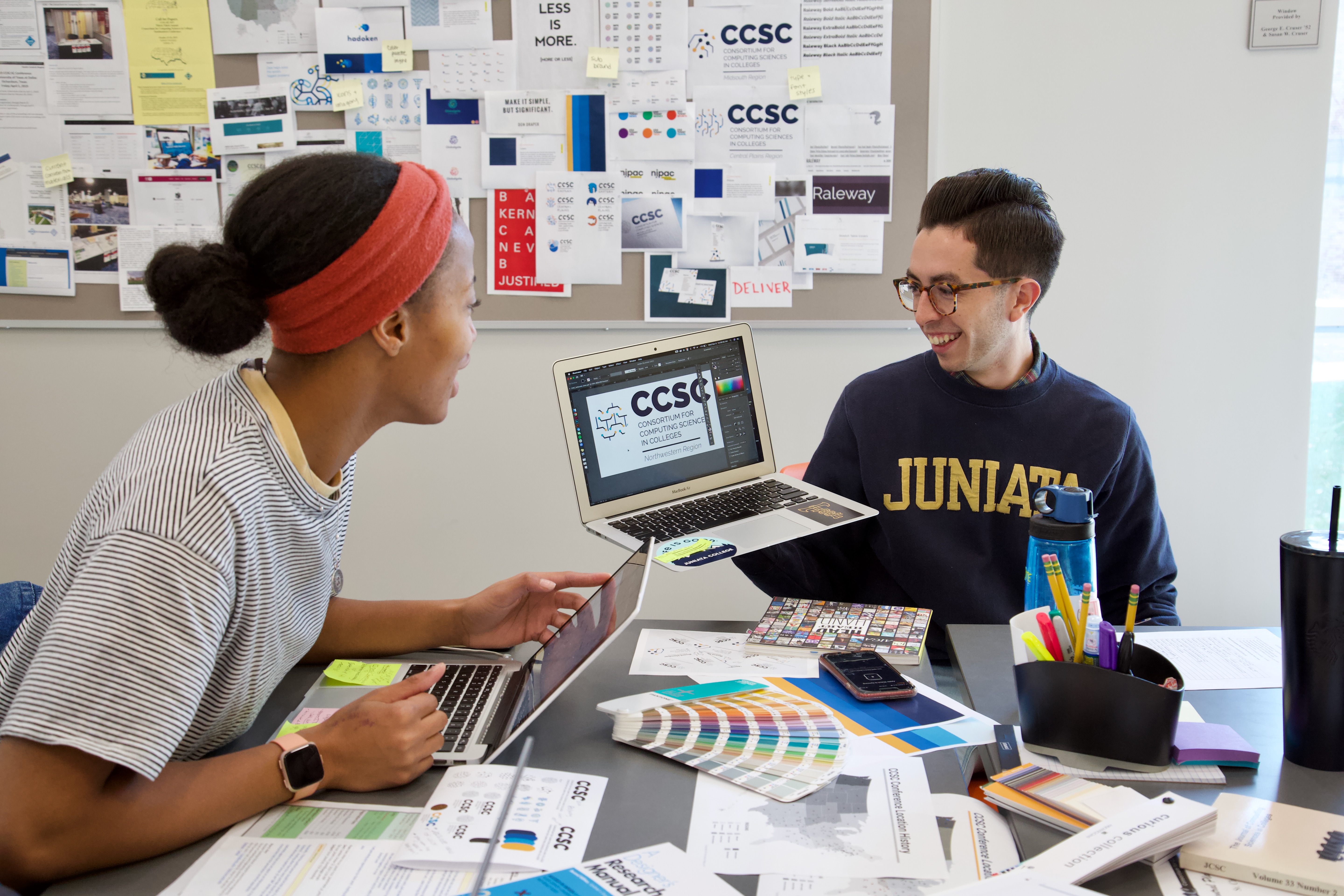 Juniata College IMA professor Ryan Gibboney leads a student critique