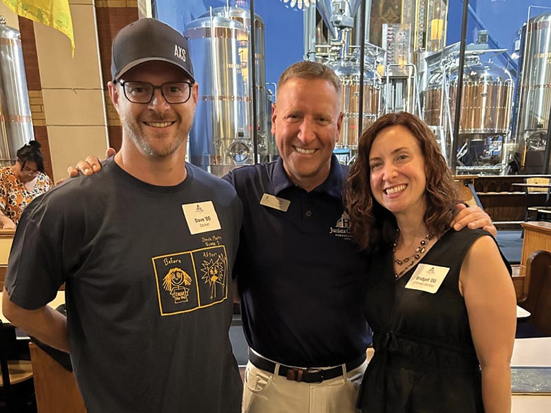 photo of president troha with event attendees