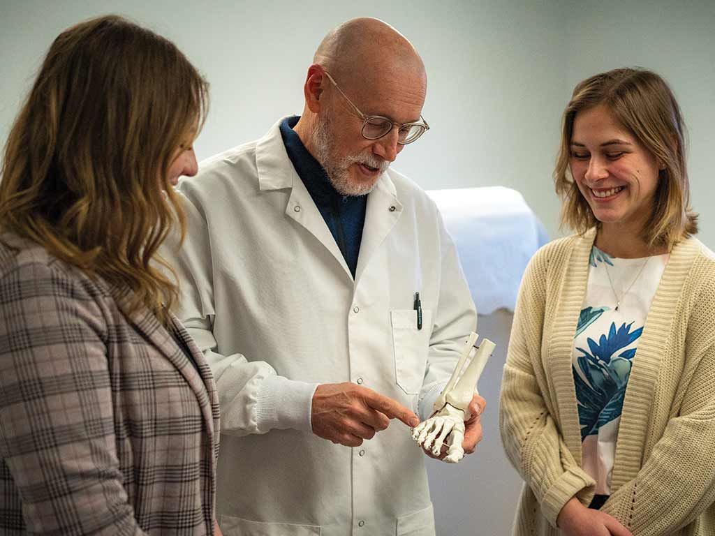 Bert Altmanshofer ’81 speaks with interns at Broad Top Area Medical Center.