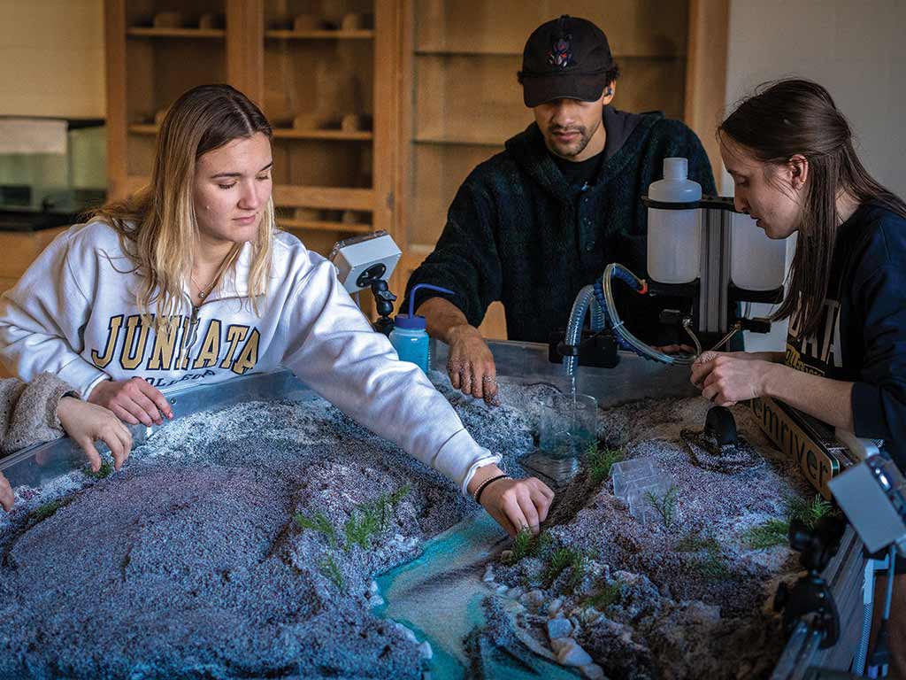 Environmental engineering students utilize the Emriver EM4 Stream Table to simulate waterway ecology