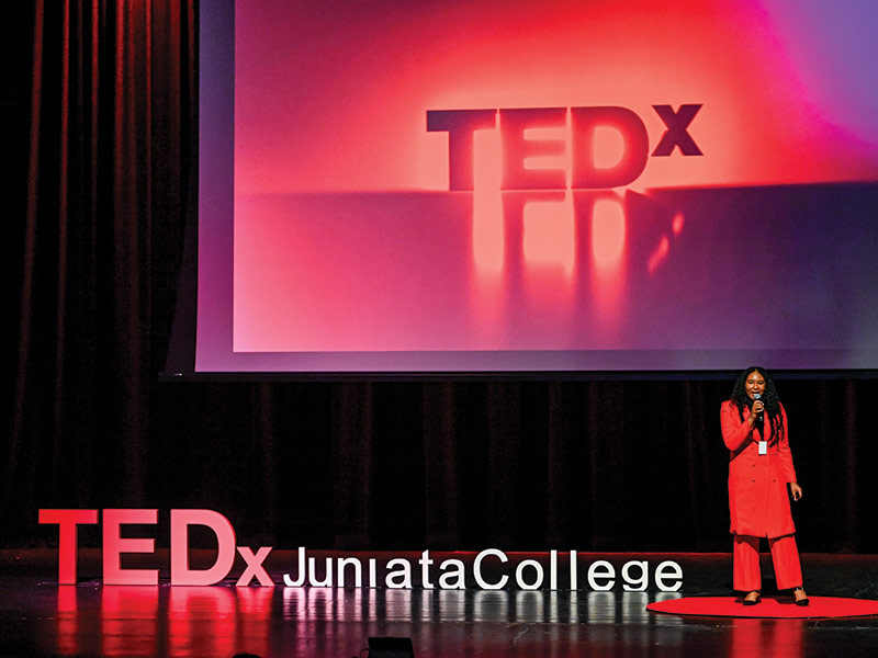 professor Tia Warrick on the TEDx stage at Juniata College