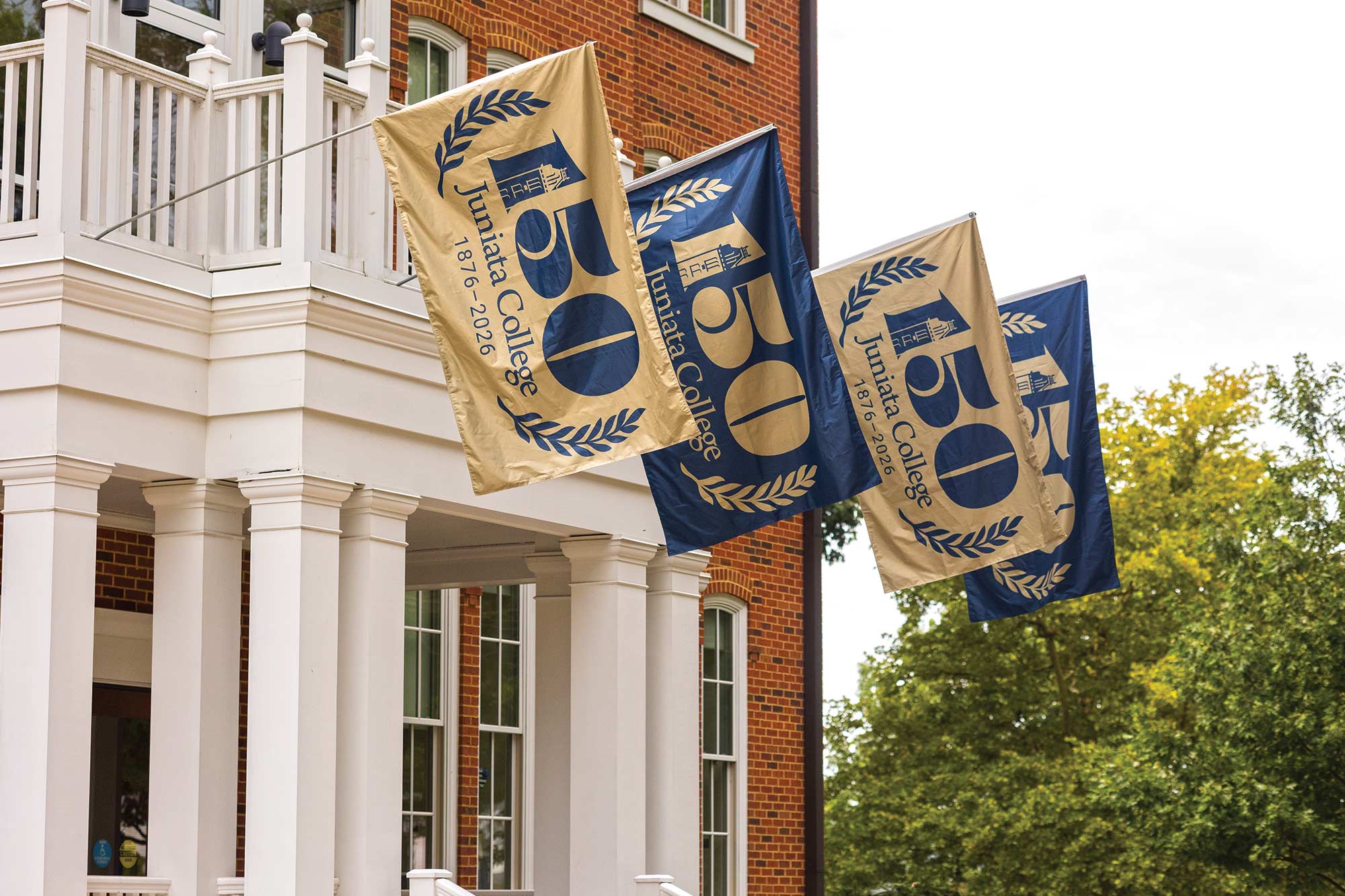 photo of flags hanging from Founders Hall