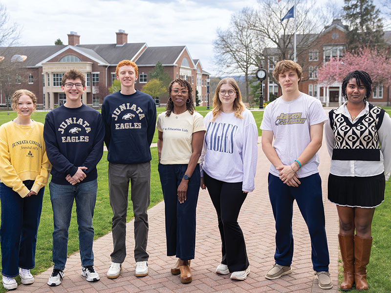 photo of Territa Poole with a group of students