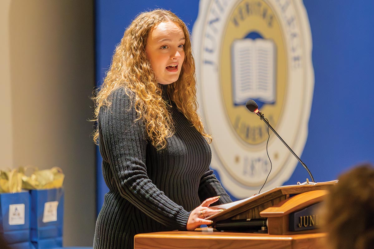 photo of Brenna Haggerty at the podium